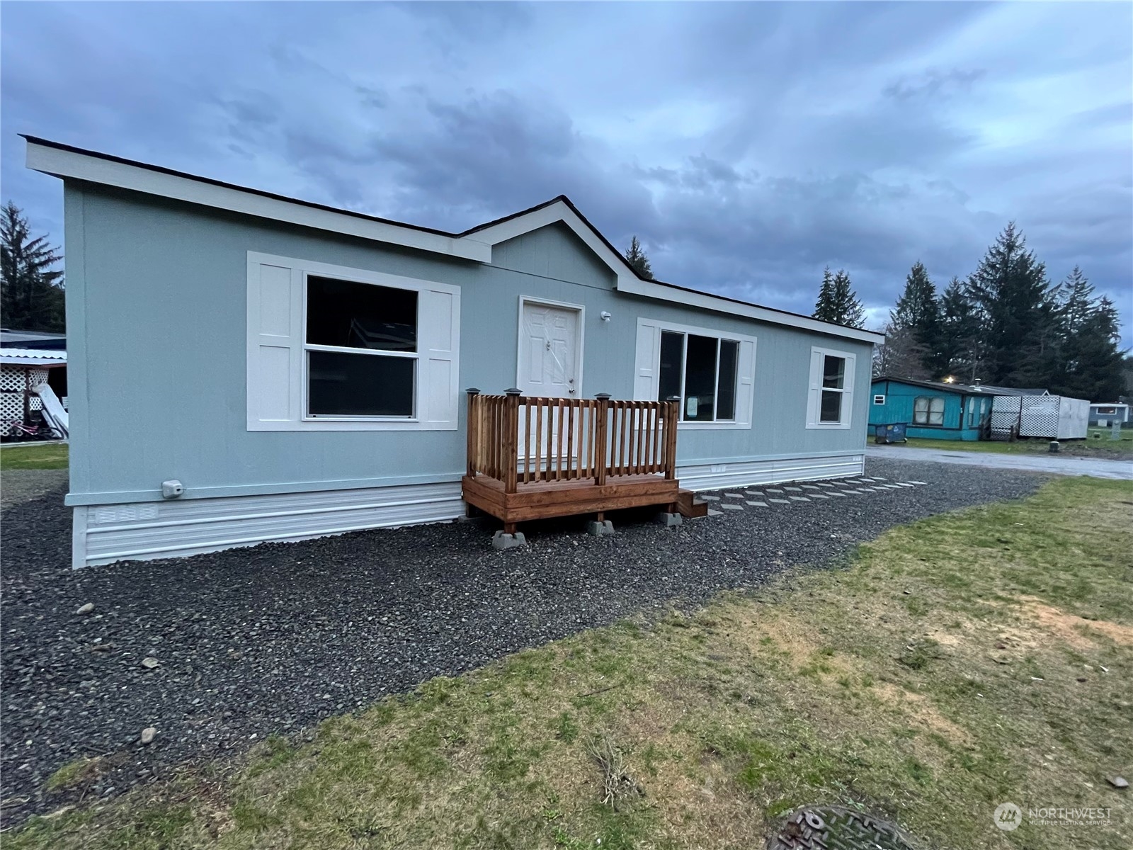 a house view with a backyard space