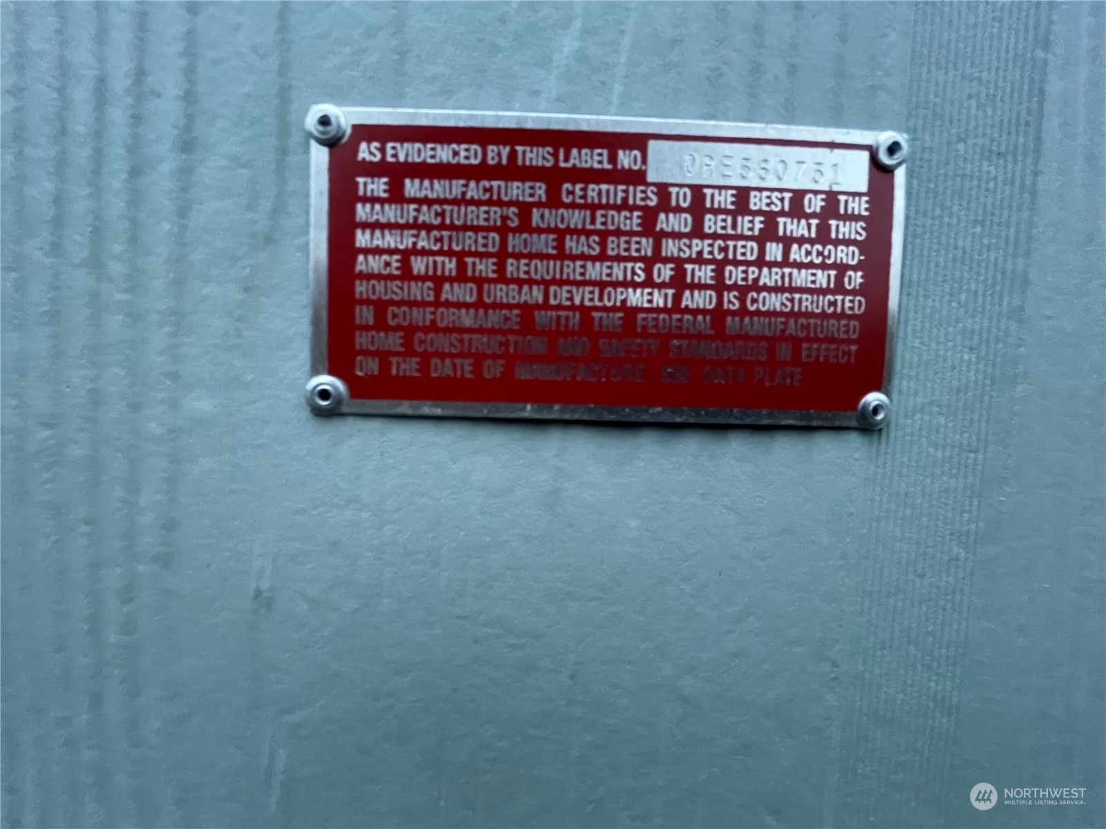 2610 Calawah Way, Unit 5 Forks, WA 98331 - Photo 12 of 12 a view of a wooden bench sitting in back of a room