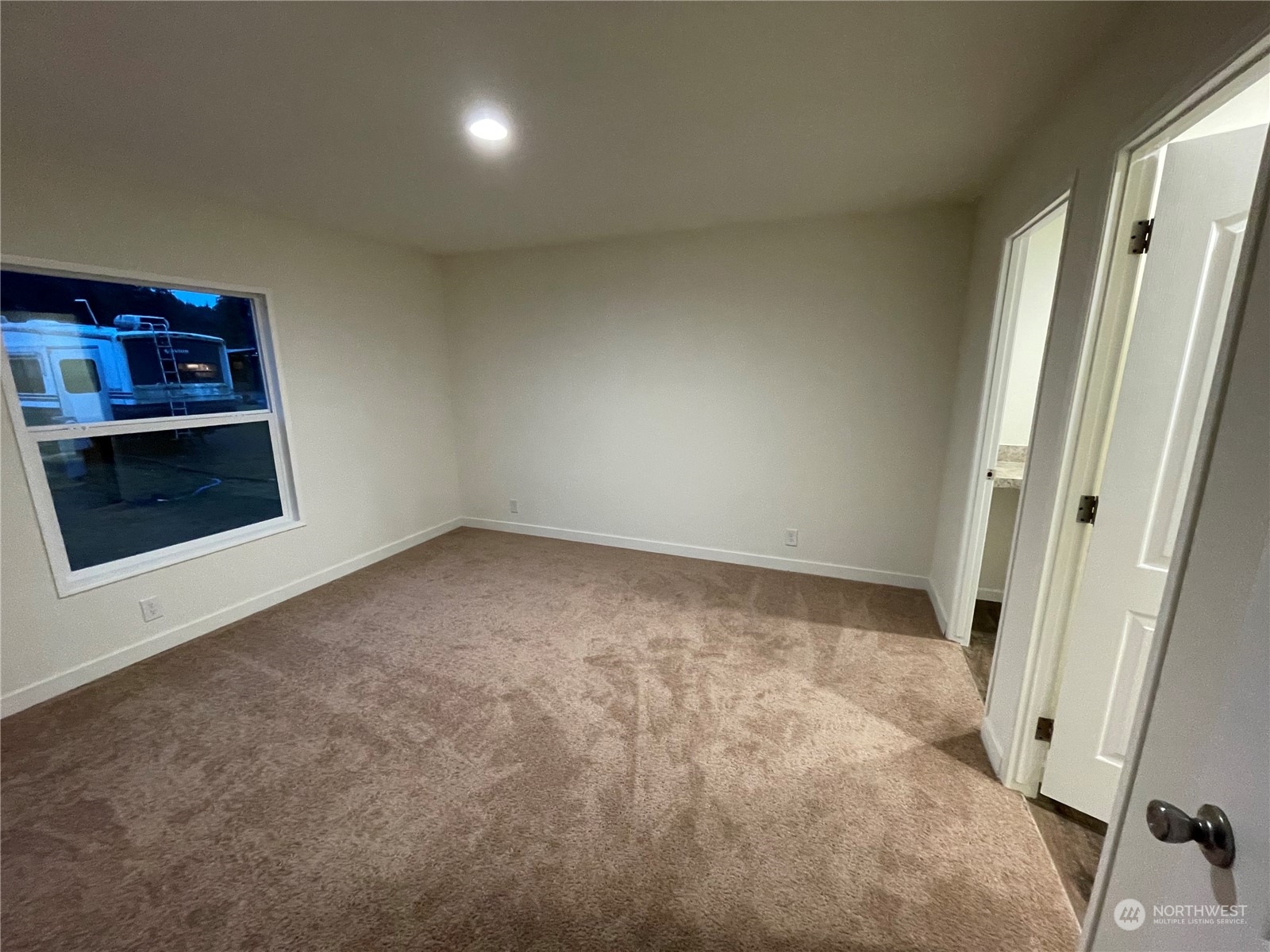 2610 Calawah Way, Unit 5 Forks, WA 98331 - Photo 6 of 12 an empty room with windows