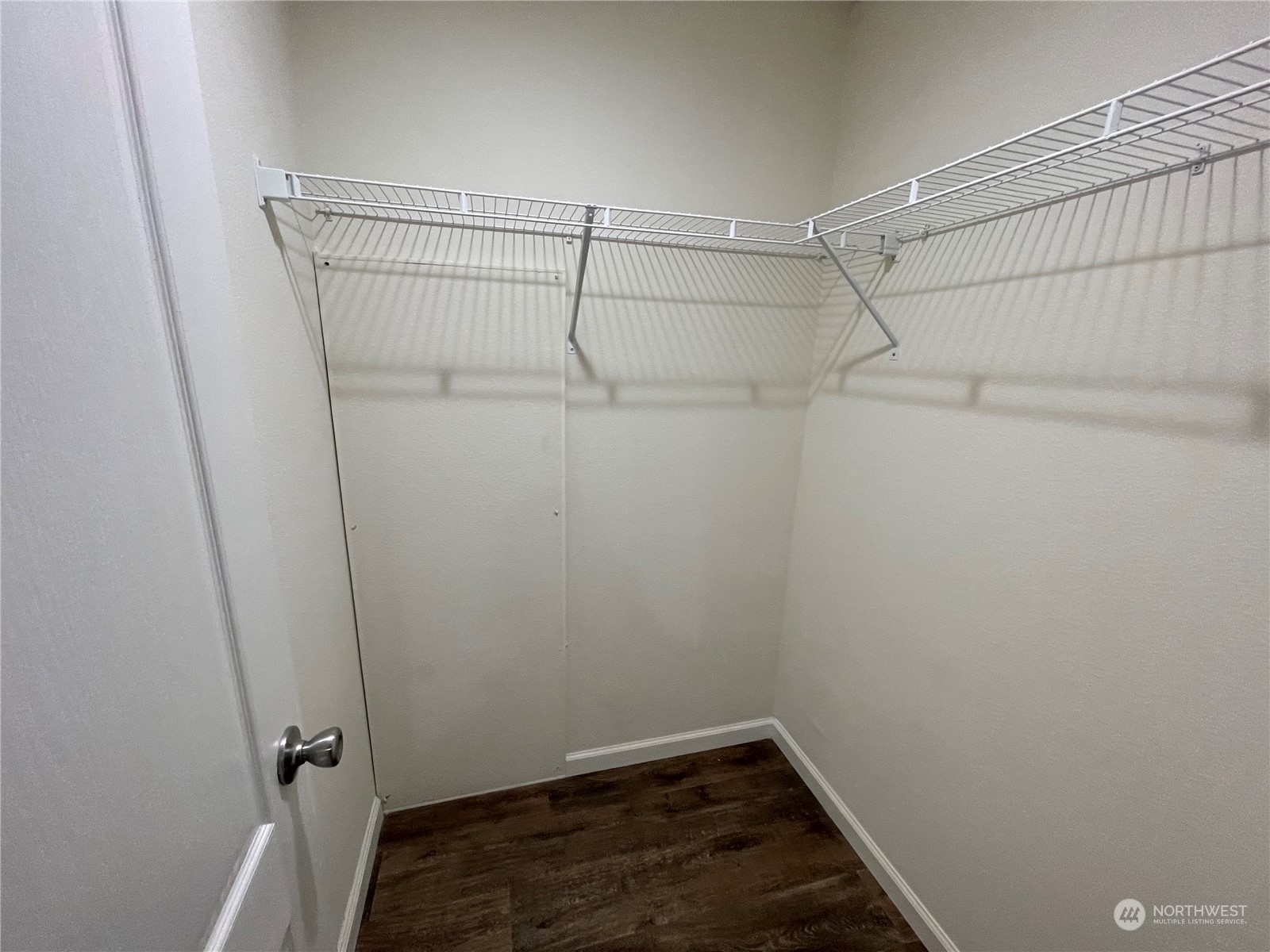 2610 Calawah Way, Unit 5 Forks, WA 98331 - Photo 7 of 12 a view of a room with racks on the wall