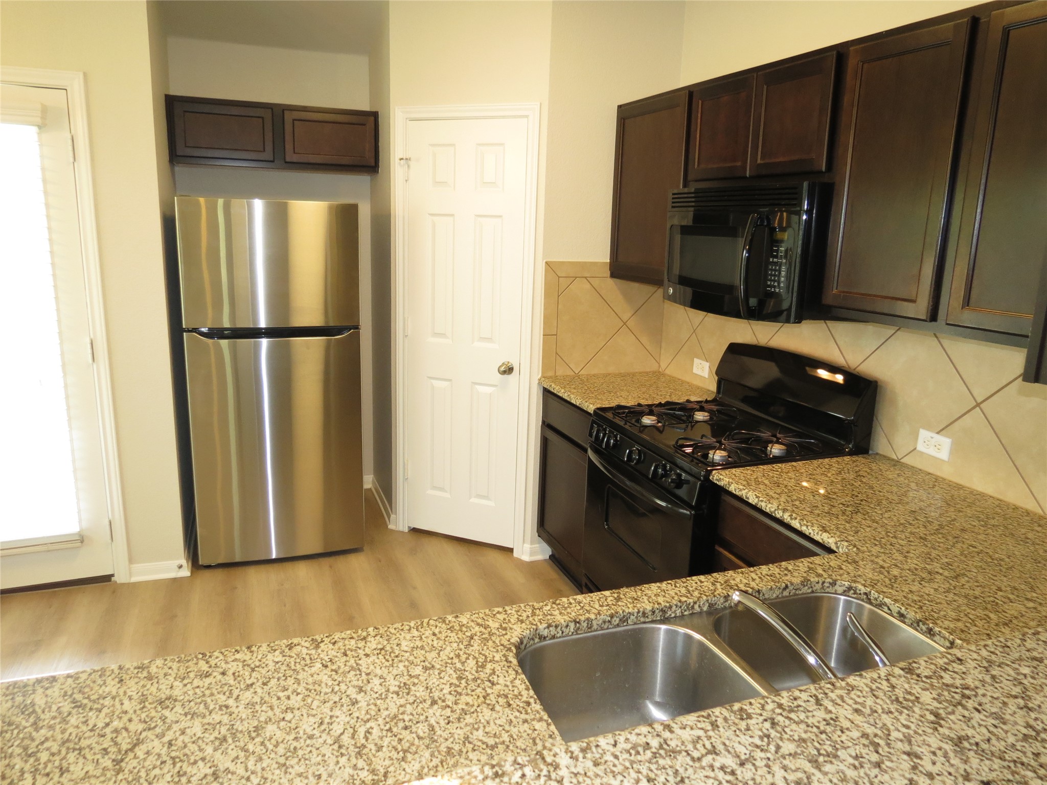 375 Musgrav Kyle, TX 78640 - Photo 10 of 31 Easy flow kitchen to panty for the cook.