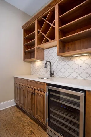 a fireplace with a vase on top of it