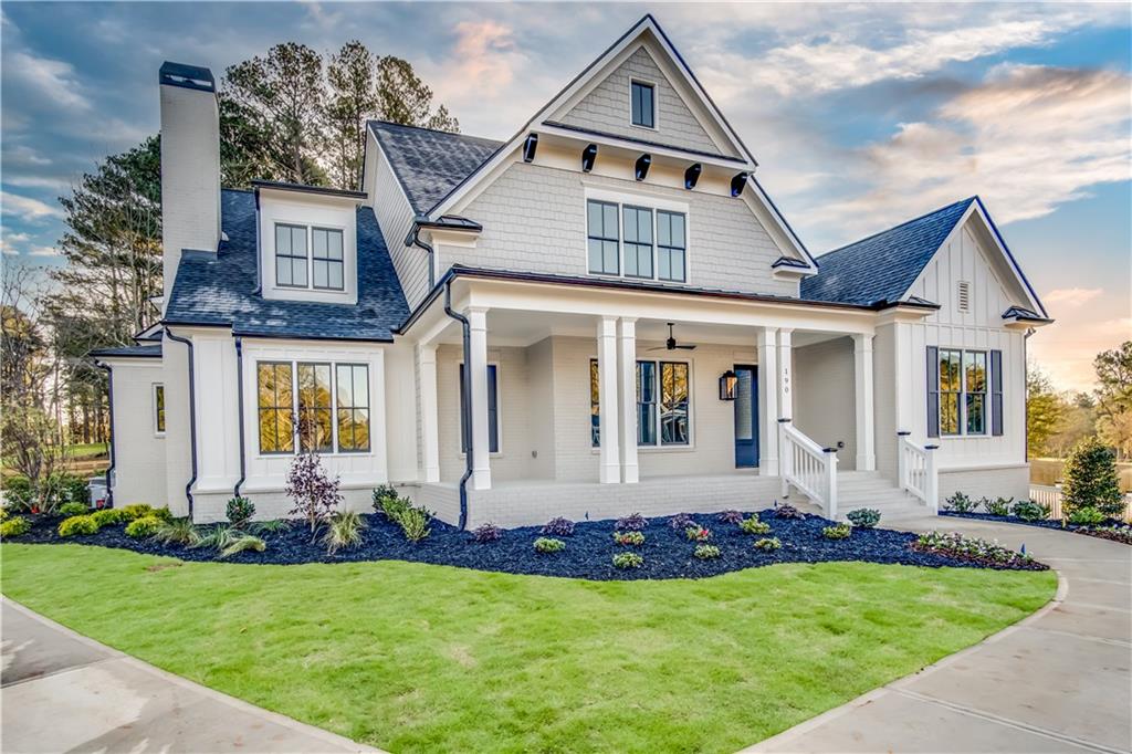 Lot 1 Cox Road Roswell, GA 30075 - Photo 3 of 36 a front view of a house with a yard