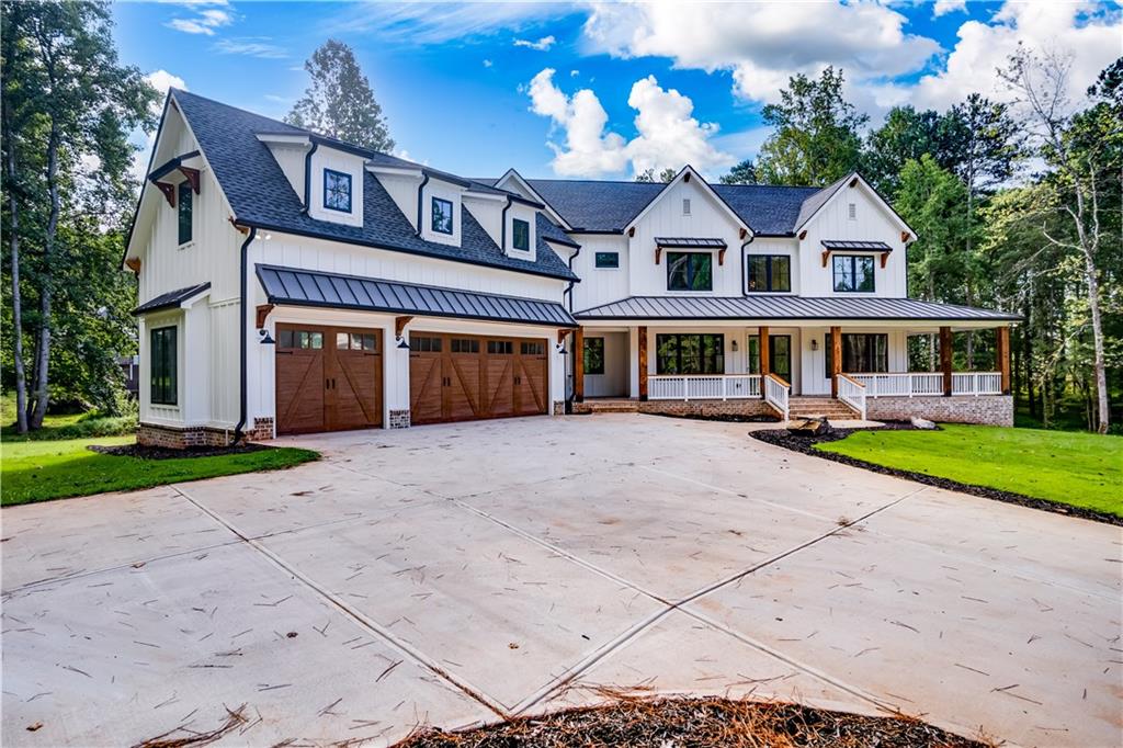 Lot 1 Cox Road Roswell, GA 30075 - Photo 31 of 36 a front view of a house with garden