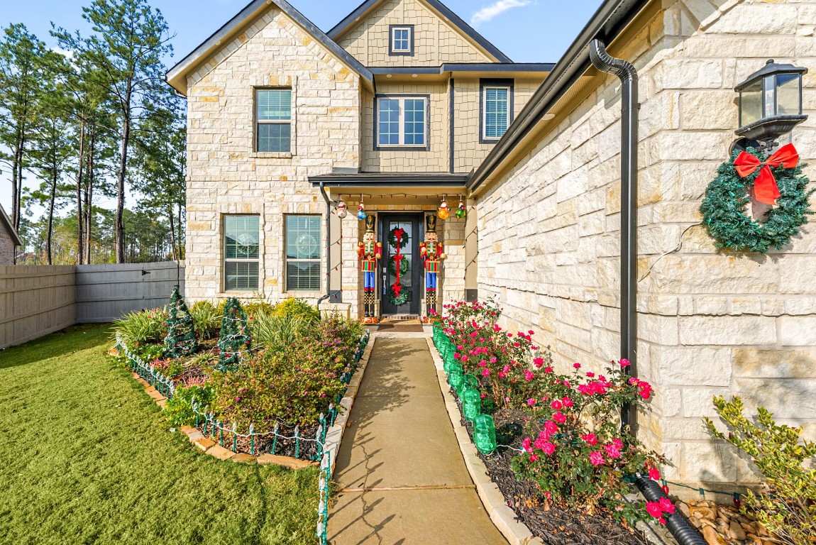 15500 Leopard Lily Lane Conroe, TX 77302 - Photo 4 of 50 a view of outdoor space yard and patio
