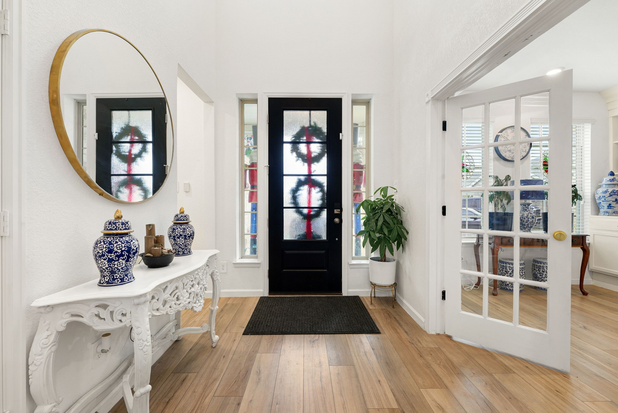15500 Leopard Lily Lane Conroe, TX 77302 - Photo 5 of 46 a view of a entryway door of the room and living room