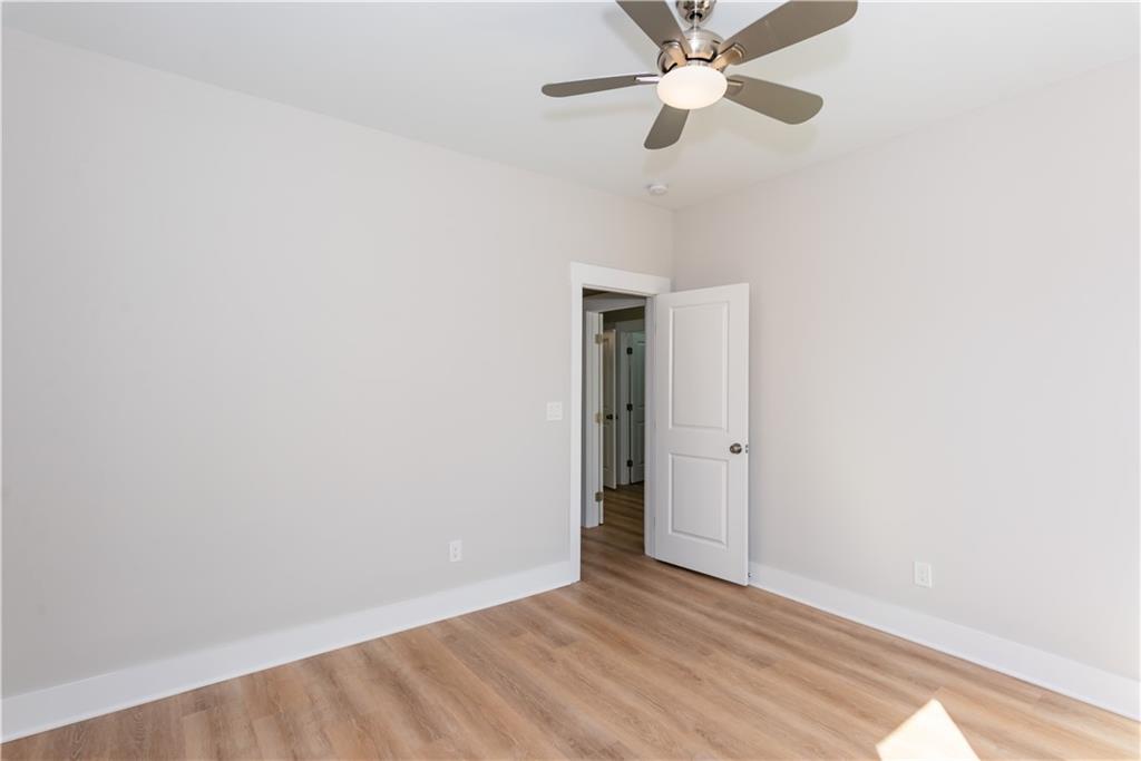 3286 Bachelor Street East Point, GA 30344 - Photo 33 of 45 a view of an empty room with a ceiling fan