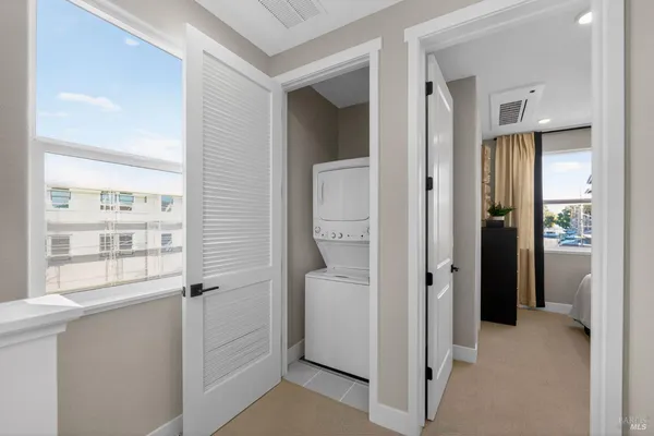 a view of a bathroom from a hallway