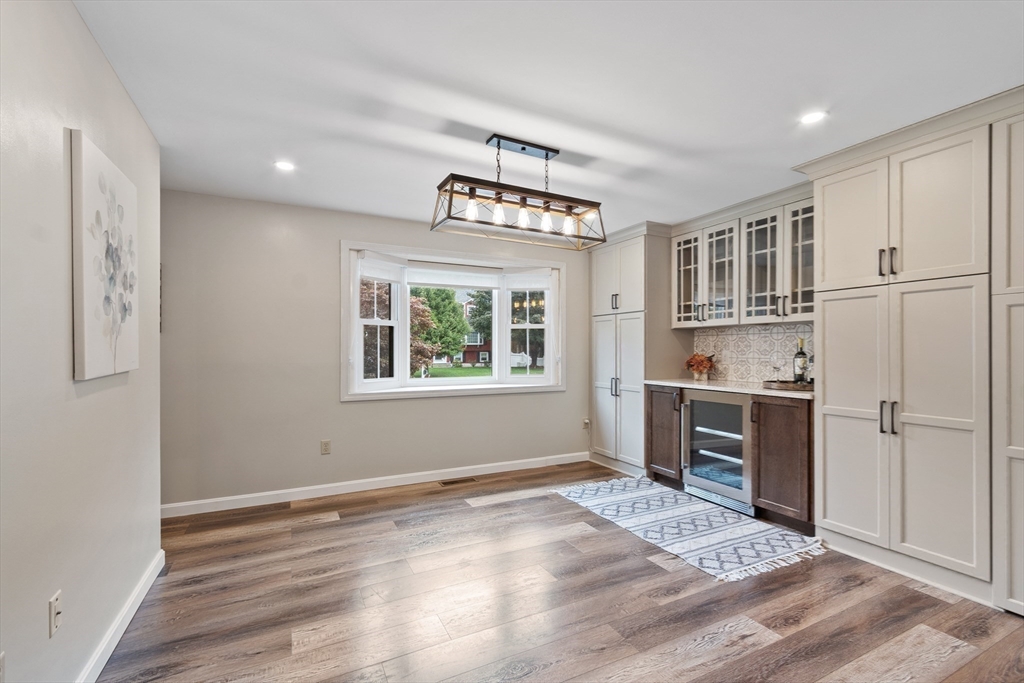 84 Constance Drive Lowell, MA 01854 - Photo 12 of 27 a view of kitchen with stainless steel appliances granite countertop a refrigerator and a stove top oven