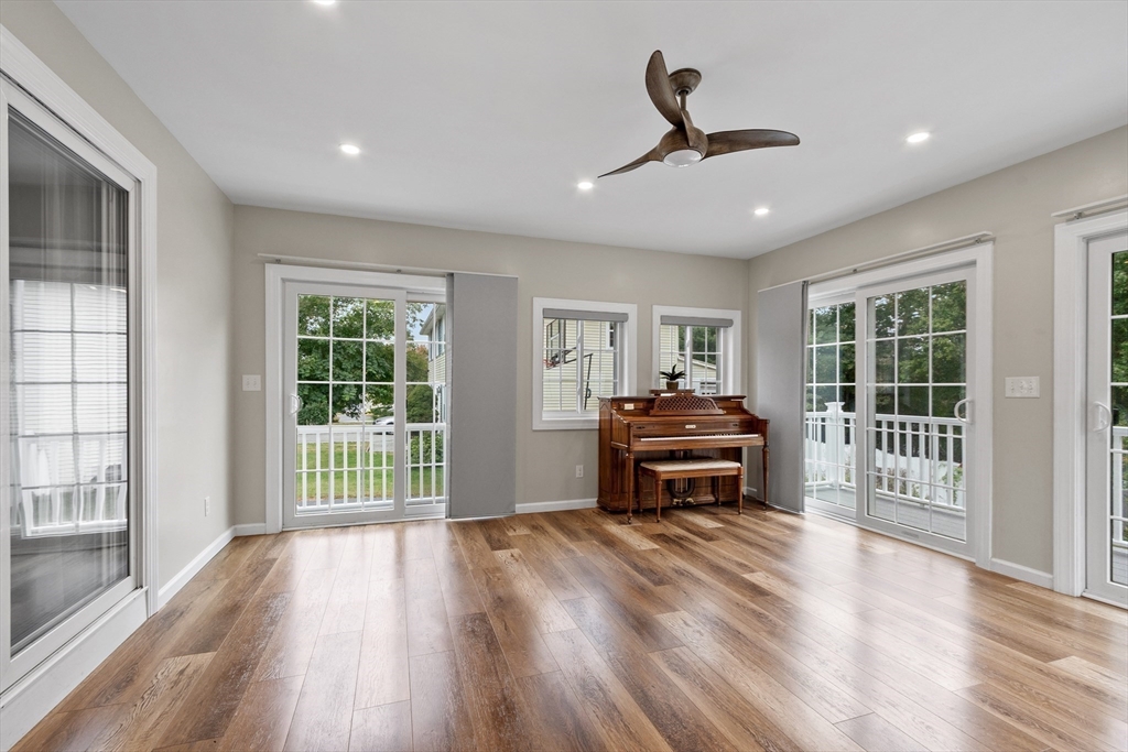 84 Constance Drive Lowell, MA 01854 - Photo 17 of 27 a living room with furniture and wooden floor