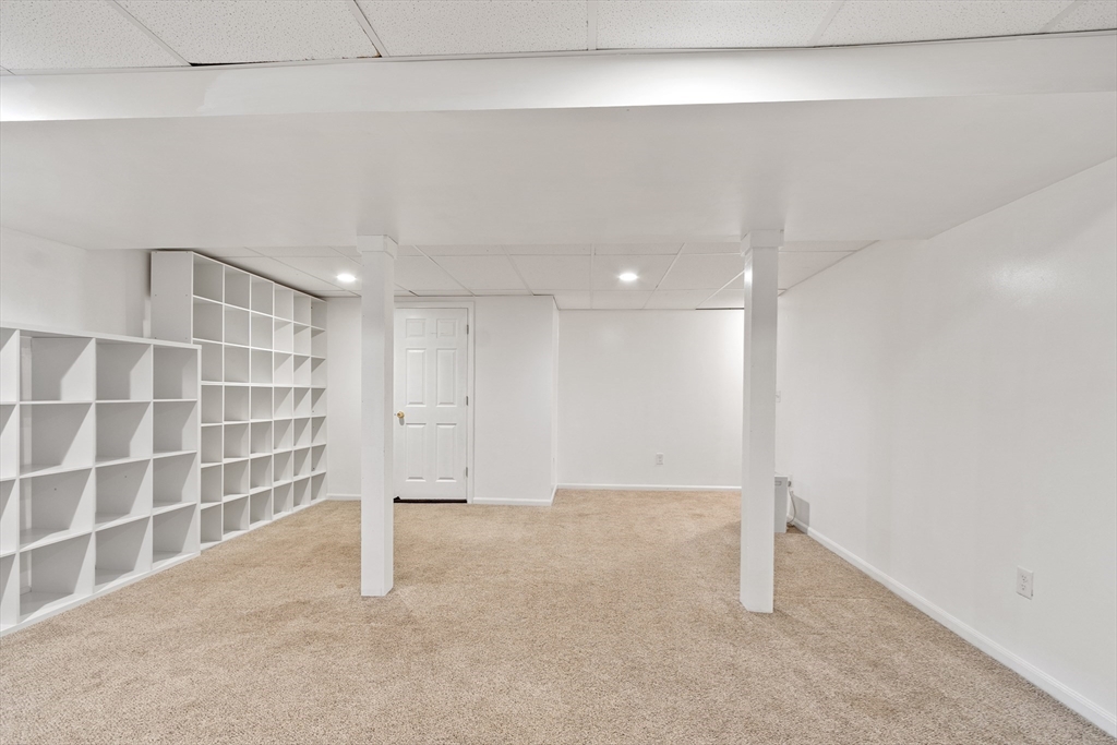 84 Constance Drive Lowell, MA 01854 - Photo 18 of 27 a view of an empty room with a window