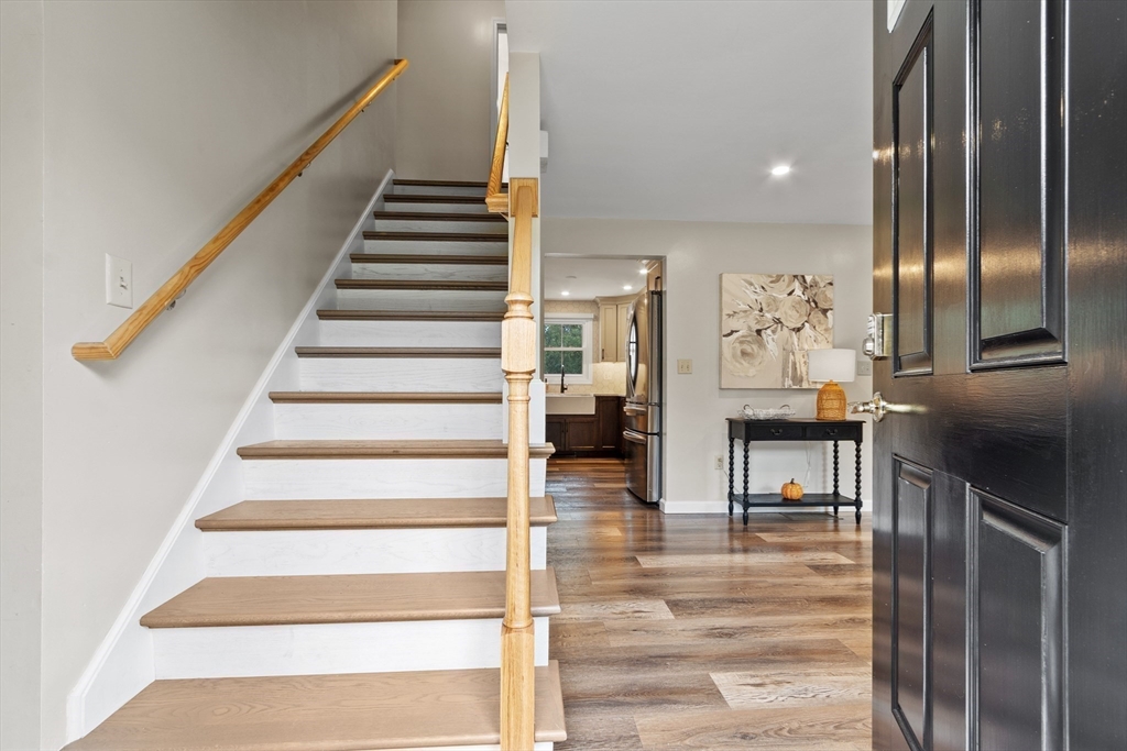 84 Constance Drive Lowell, MA 01854 - Photo 21 of 27 a view of entryway and hall with wooden floor
