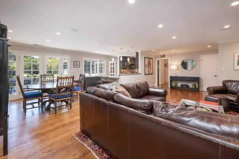 a kitchen with stainless steel appliances granite countertop a stove and a sink
