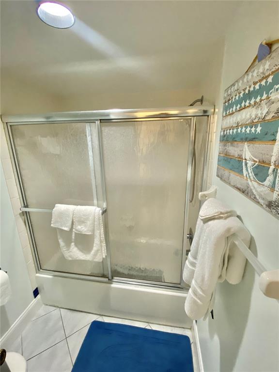 6035 Sea Ranch Drive, Unit 901 Hudson, FL 34667 - Photo 13 of 72 a bathroom with a shower