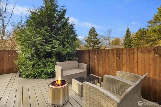 a outdoor living space with furniture and city view