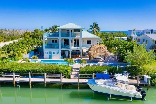 a view of a chairs and table in a patio