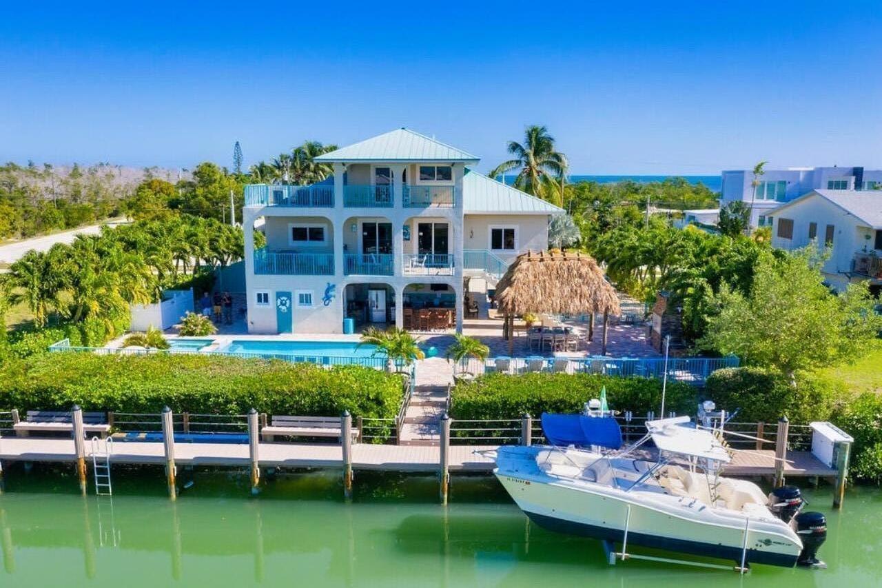 a view of a chairs and table in a patio
