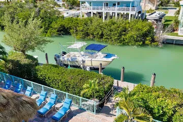 a view of a garden with sitting area