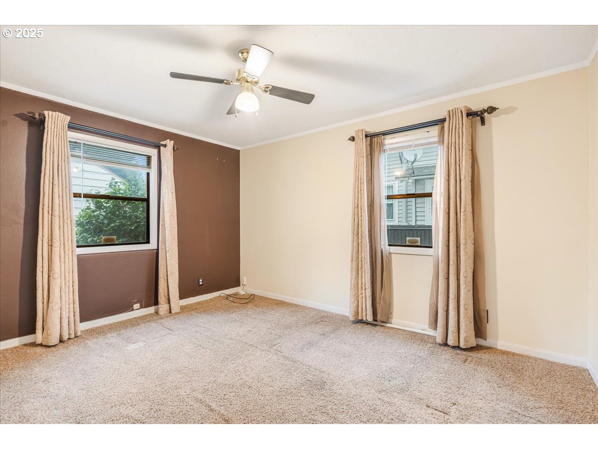 5925 Northeast 27th Avenue Portland, OR 97211 - Photo 14 of 25 a view of an empty room with a window