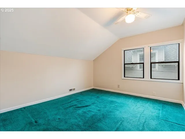 a view of an empty room with window