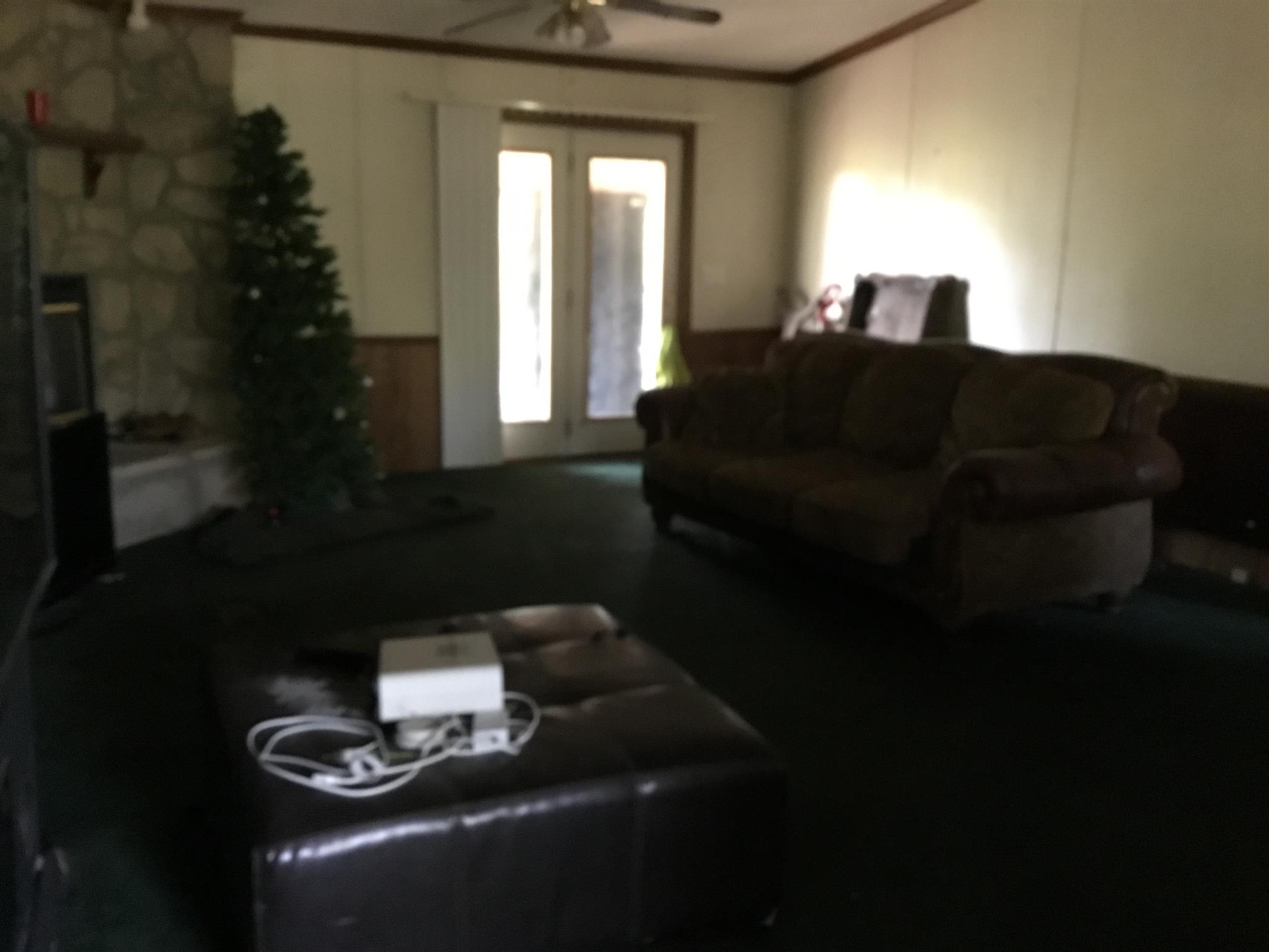 2085 Sugar Camp Road Springfield, TN 37172 - Photo 13 of 18 a living room with furniture and a window