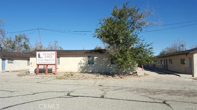 14301 Frontage Road, Unit 6 North Edwards, CA 93523 - Photo 1 of 1 a view of a house with a snow in the yard