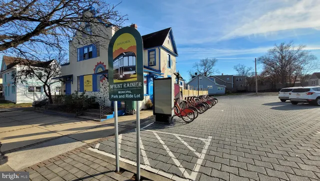 a view of multiple houses with a street