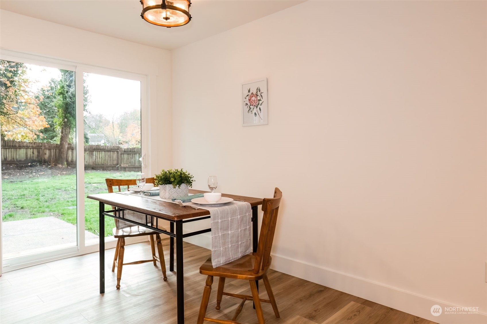 3719 Rhapsody Drive Southeast Port Orchard, WA 98366 - Photo 20 of 40 a view of a dining room with a table and chairs