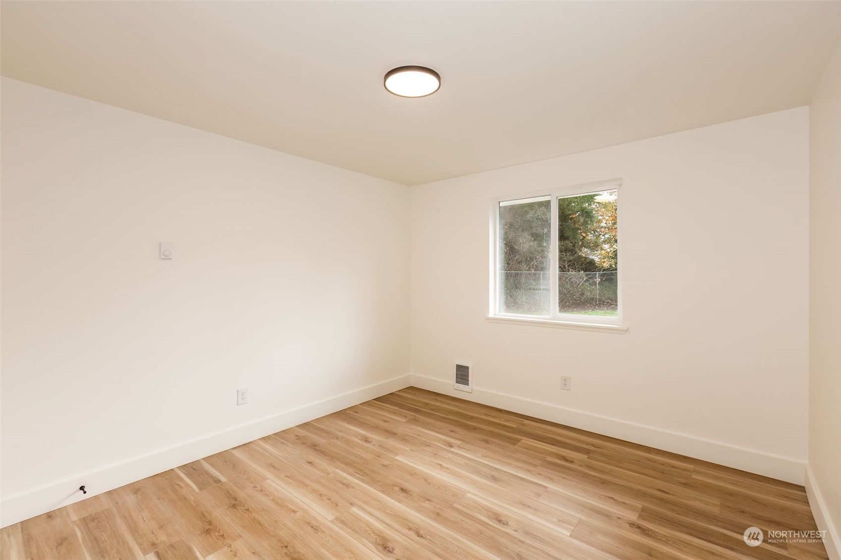3719 Rhapsody Drive Southeast Port Orchard, WA 98366 - Photo 31 of 40 an empty room with a window
