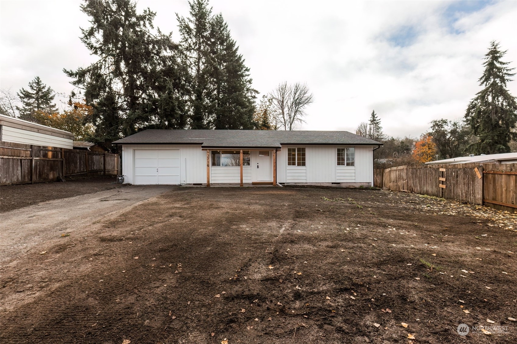 3719 Rhapsody Drive Southeast Port Orchard, WA 98366 - Photo 4 of 40 a view of a house with a backyard