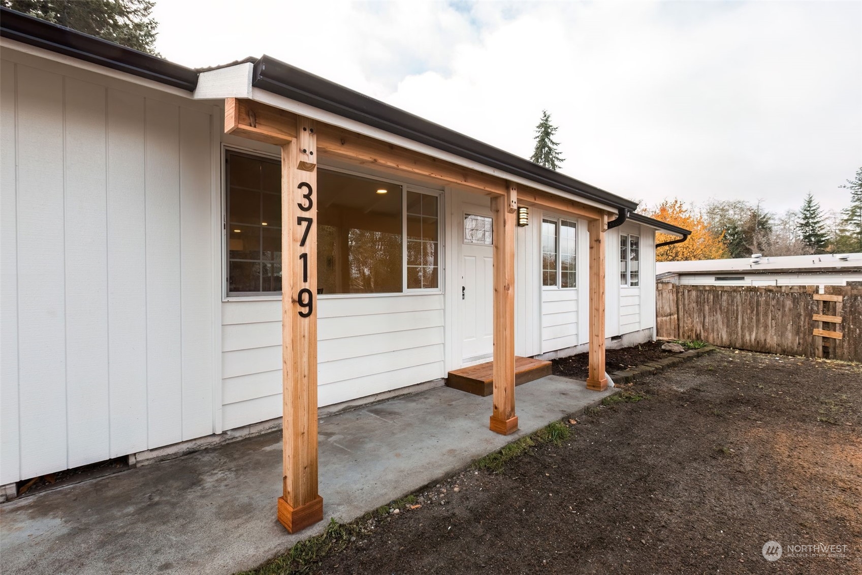3719 Rhapsody Drive Southeast Port Orchard, WA 98366 - Photo 5 of 40 a front view of a house with a porch