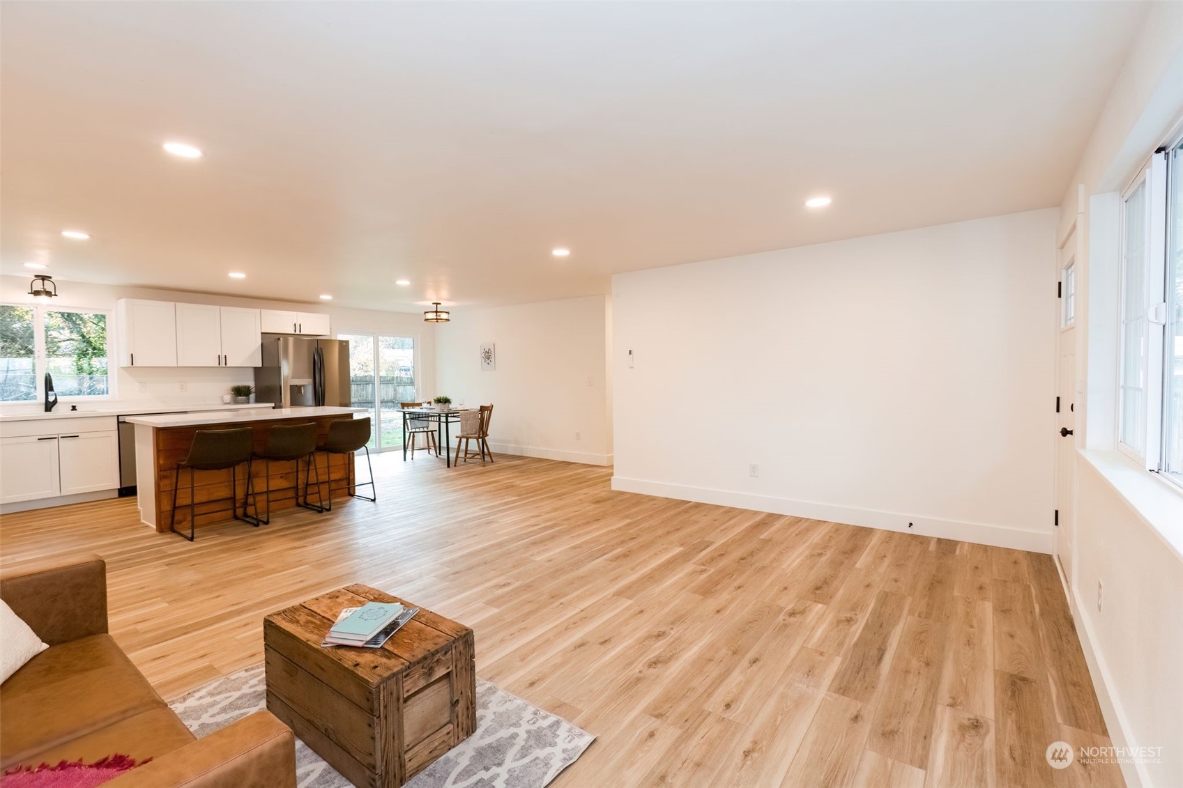 3719 Rhapsody Drive Southeast Port Orchard, WA 98366 - Photo 7 of 40 a living room with furniture and a table