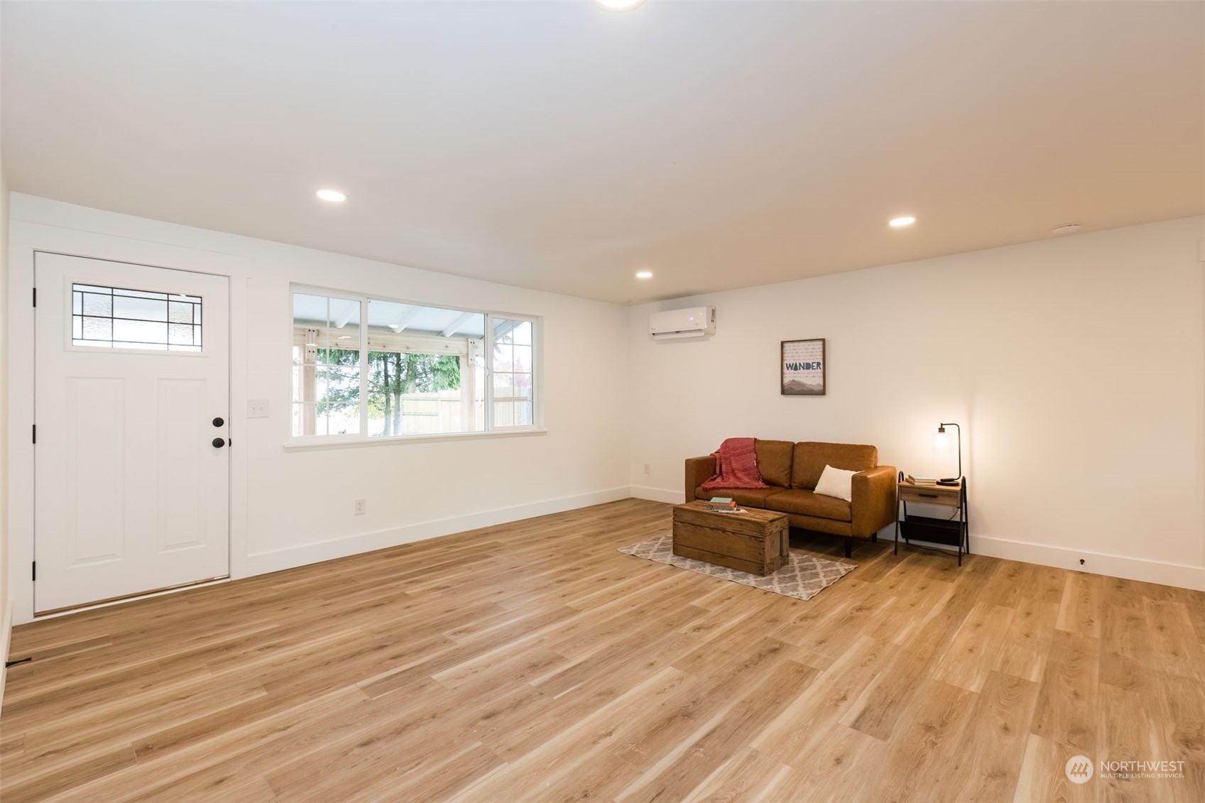3719 Rhapsody Drive Southeast Port Orchard, WA 98366 - Photo 8 of 40 a living room with furniture and a wooden floor