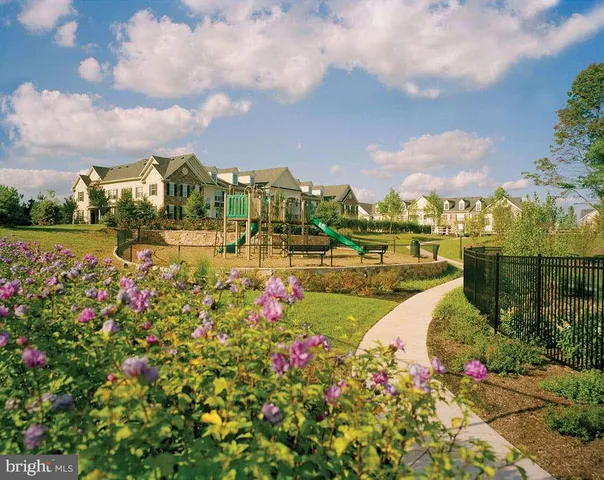 a view of a garden with houses