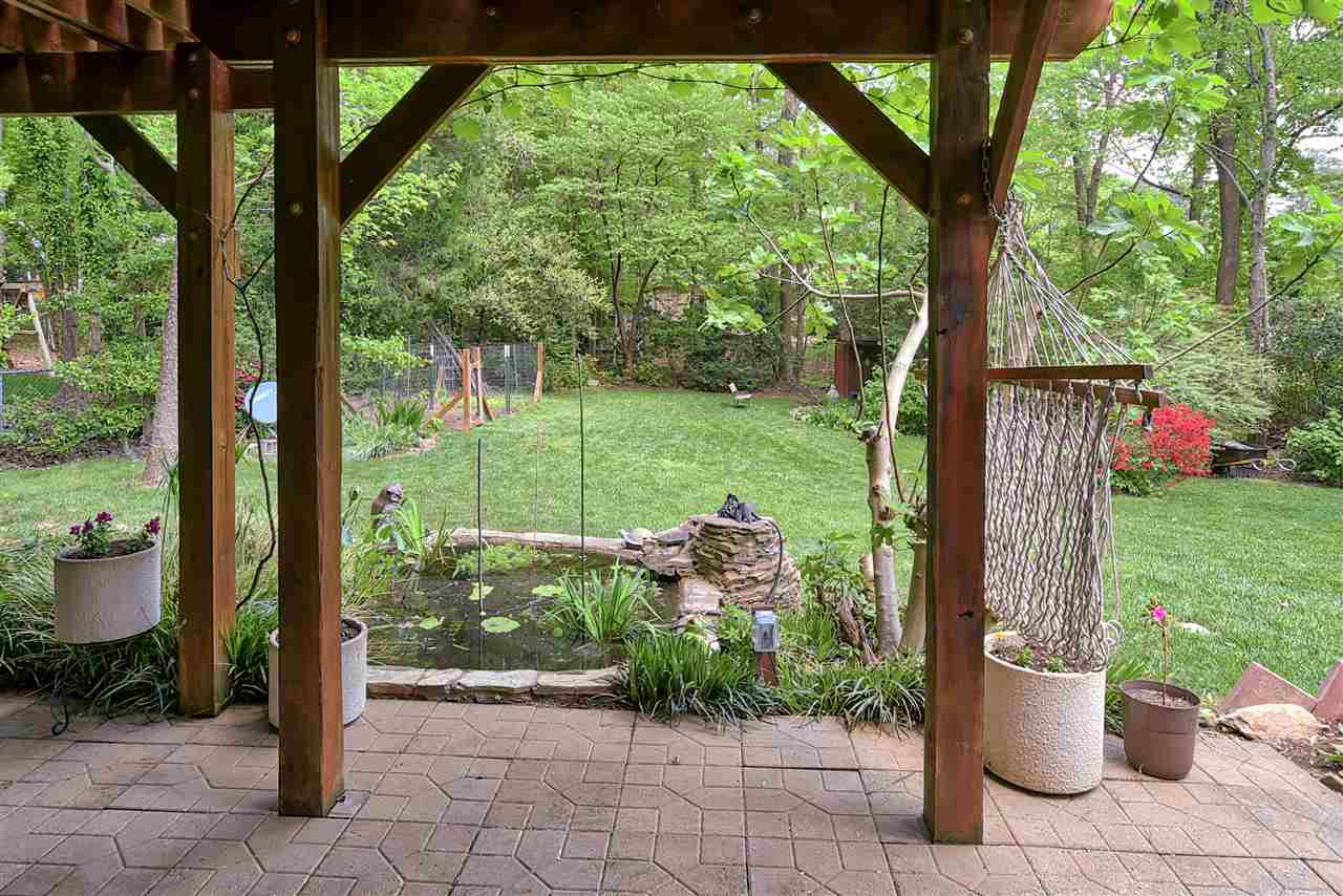 6712 Perkins Drive Raleigh, NC 27612 - Photo 26 of 30 This is the main Zen Pond located off the patio below the deck area. Beautiful Lilies, frogs and fish live happily here. Zen Pond with fountain feature