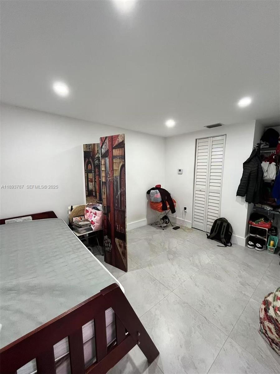 1102 Northwest 103rd Street Miami, FL 33150 - Photo 24 of 37 a view of a room with gym equipment
