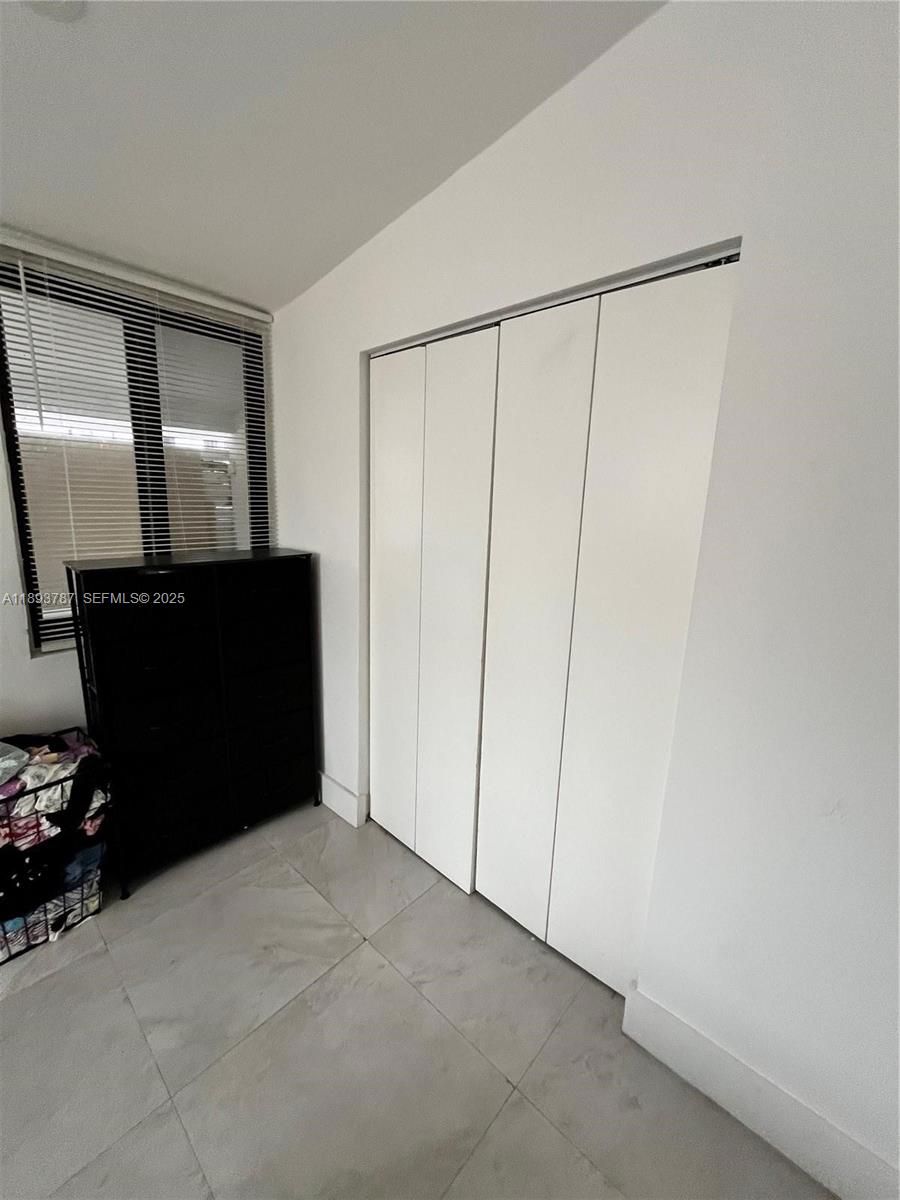 1102 Northwest 103rd Street Miami, FL 33150 - Photo 10 of 37 a view of an empty room