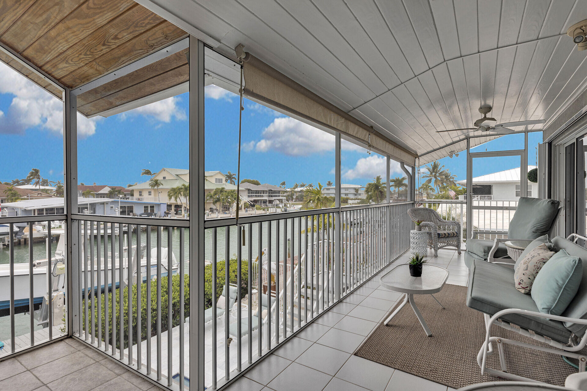 651 9th Street Key Colony Beach, FL 33051 - Photo 11 of 53 a view of a porch with furniture
