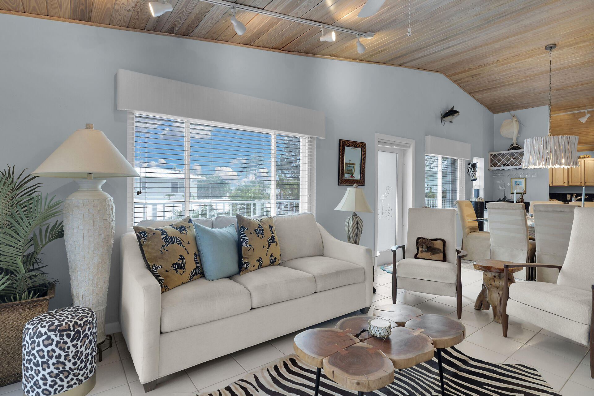 651 9th Street Key Colony Beach, FL 33051 - Photo 16 of 53 a living room with furniture and a large window