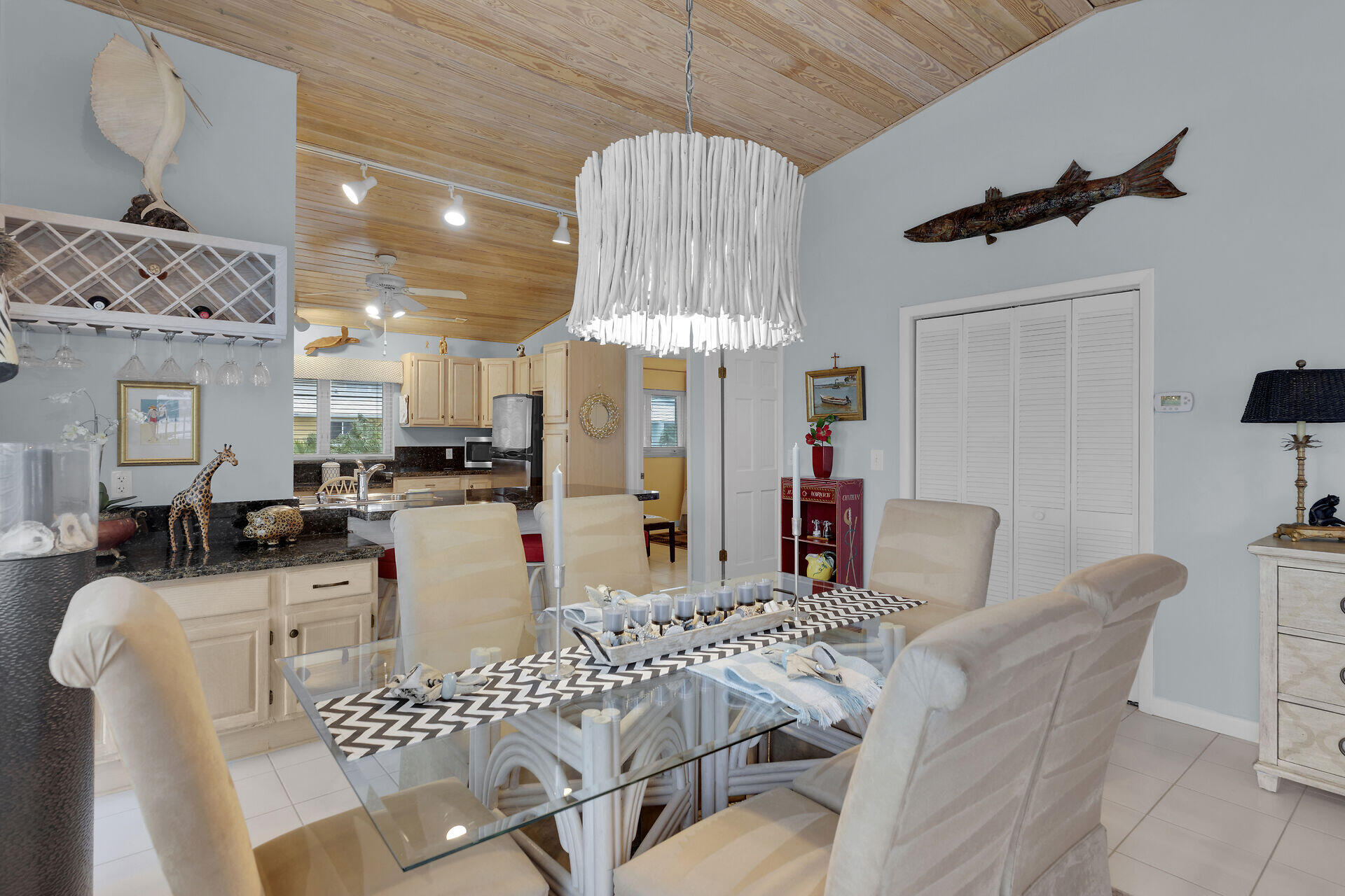 651 9th Street Key Colony Beach, FL 33051 - Photo 18 of 53 a view of a dining room with furniture