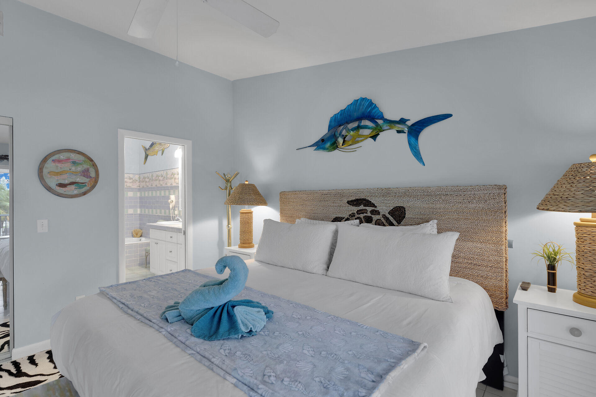 651 9th Street Key Colony Beach, FL 33051 - Photo 26 of 53 a bedroom with a bed and a couch