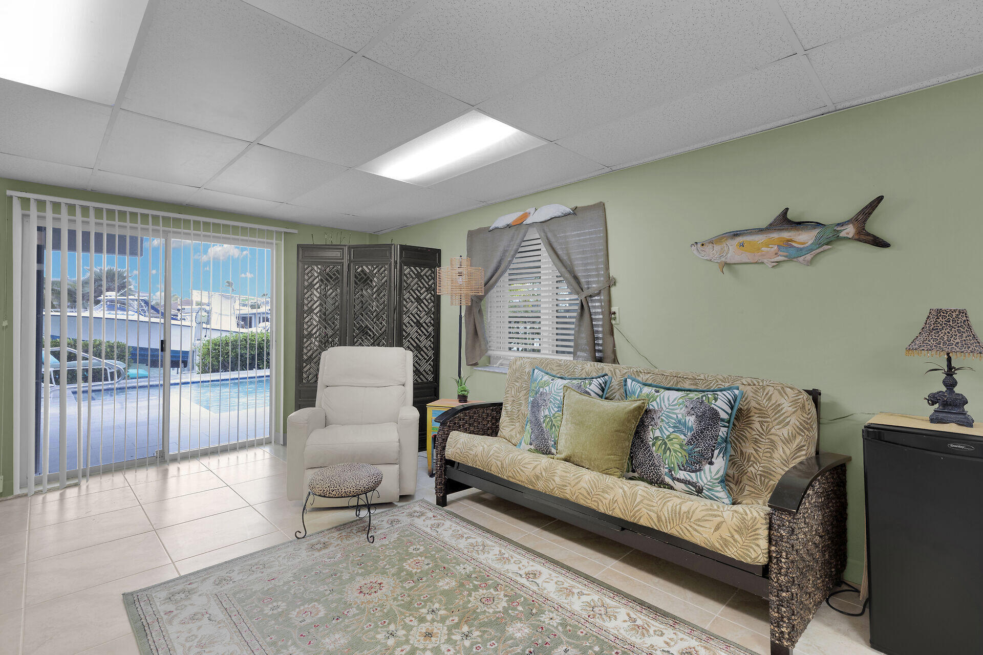 651 9th Street Key Colony Beach, FL 33051 - Photo 33 of 53 a living room with furniture and a table