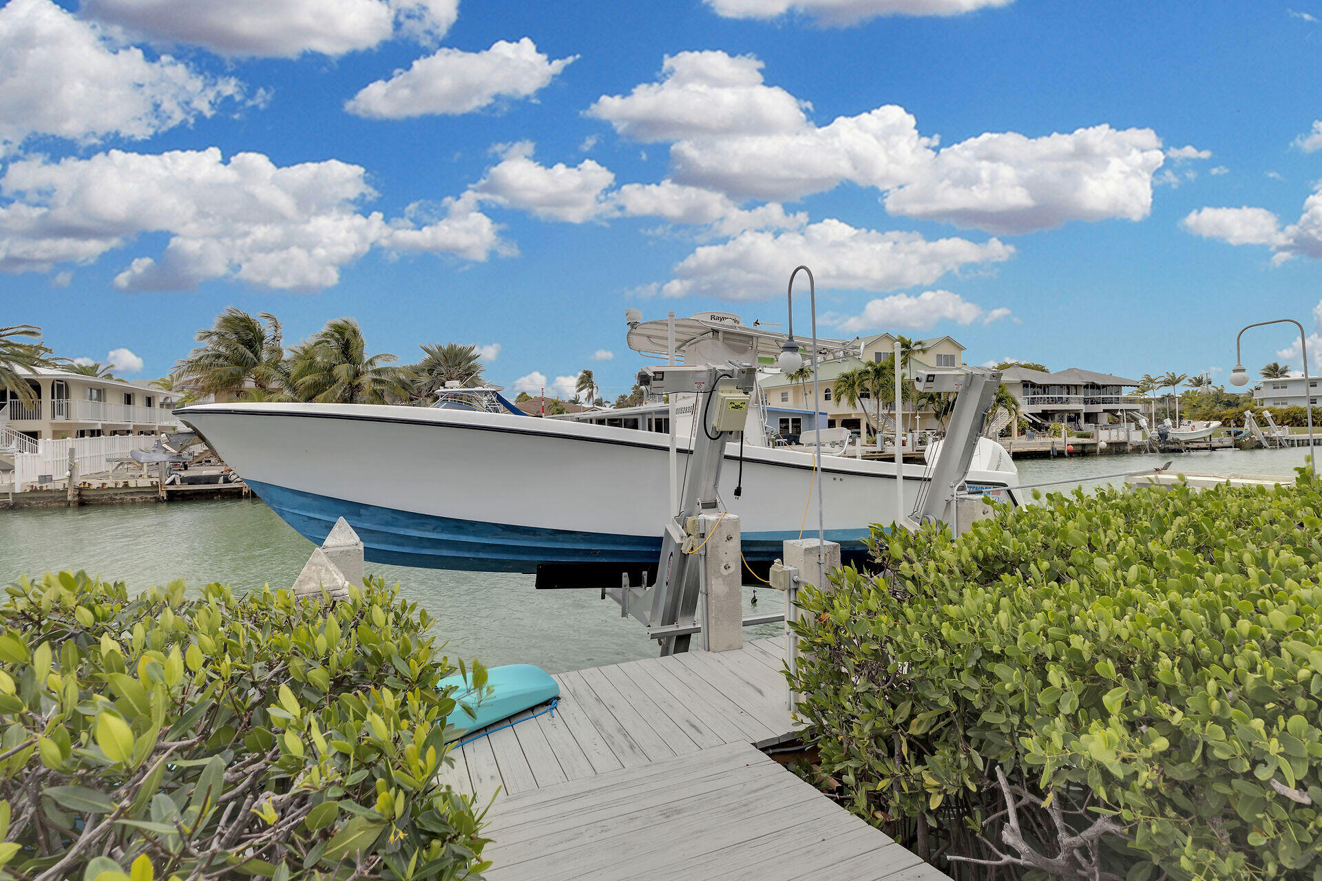 651 9th Street Key Colony Beach, FL 33051 - Photo 4 of 53 a view of a swimming pool with a terrace
