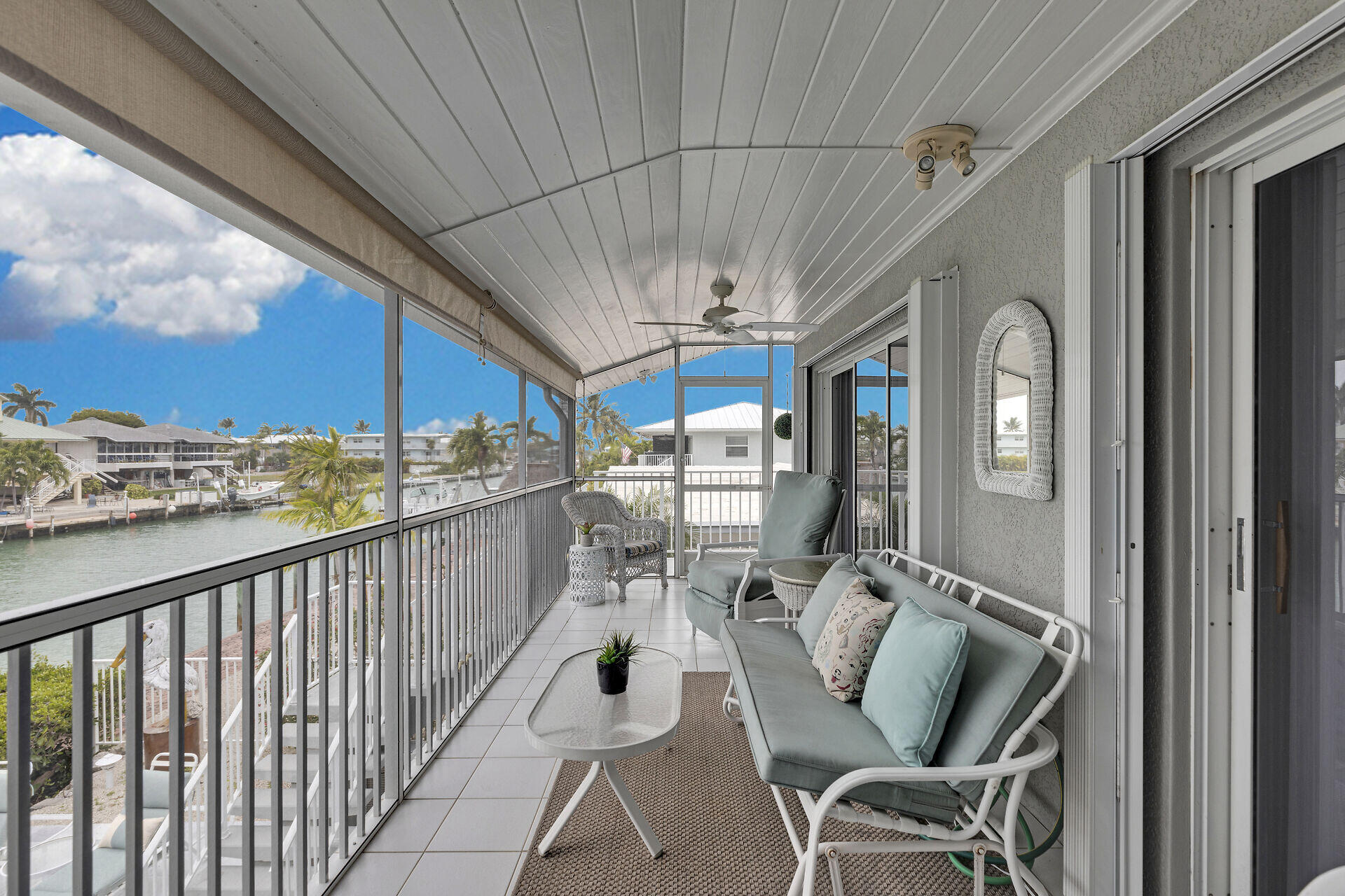 651 9th Street Key Colony Beach, FL 33051 - Photo 10 of 53 a view of a balcony with furniture
