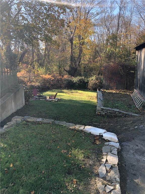 17 Spring Street Westerly, RI 02891 - Photo 15 of 29 Backyard, fenced, private and room for some out door fun!