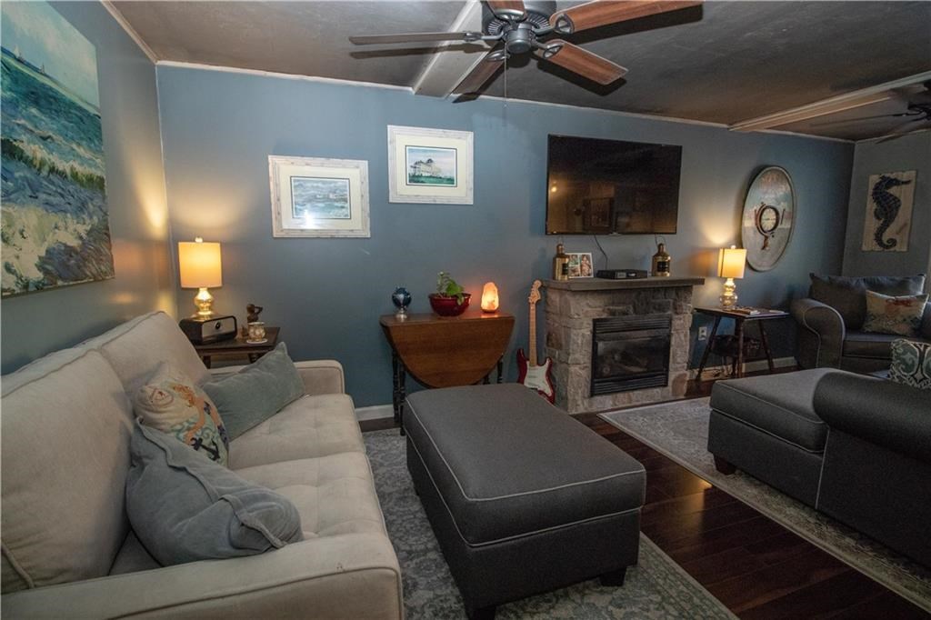17 Spring Street Westerly, RI 02891 - Photo 20 of 29 Lower level apartment living room, gas fireplace!
