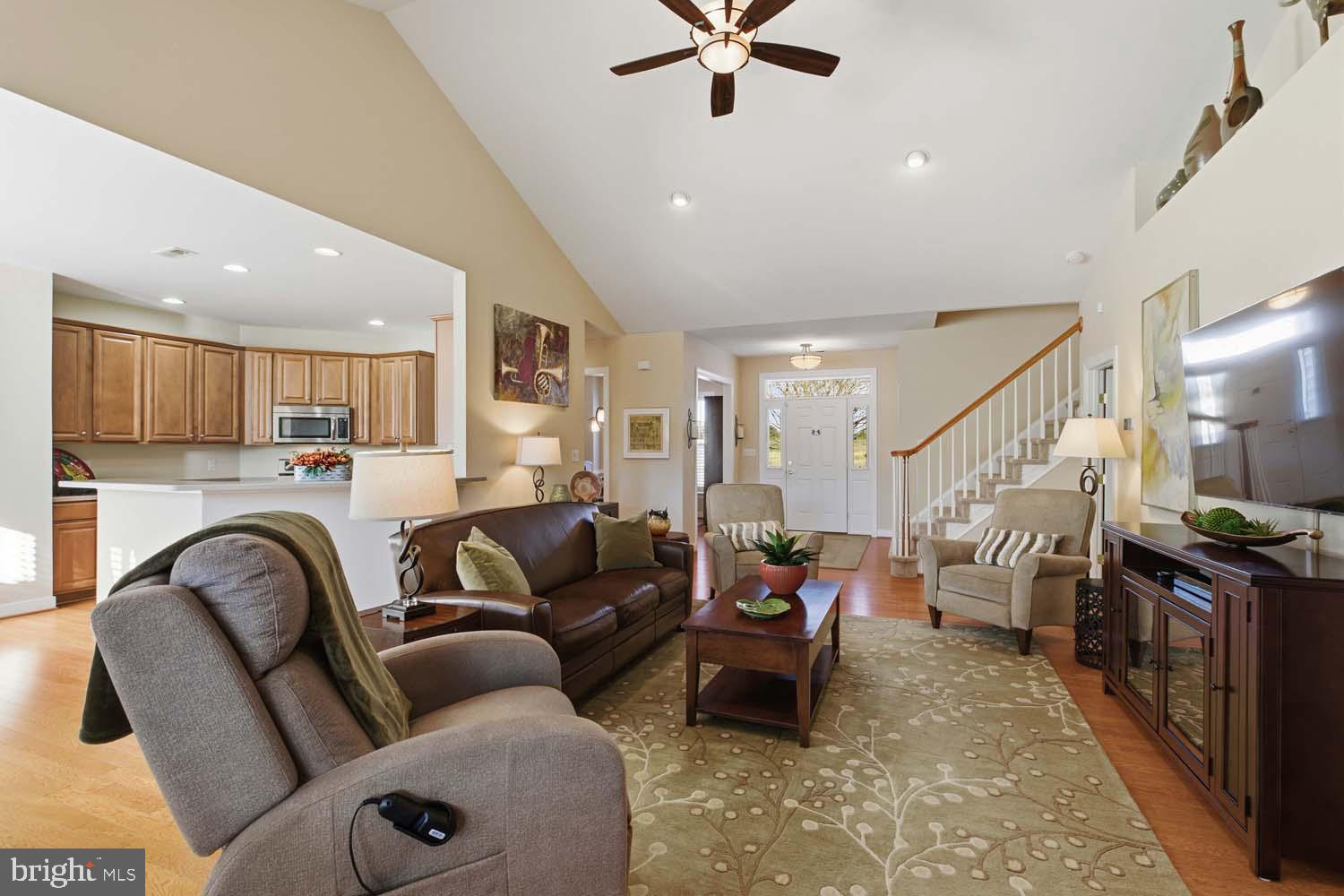 464 Middle Gate Irvington, VA 22480 - Photo 12 of 46 a living room with furniture and a fireplace