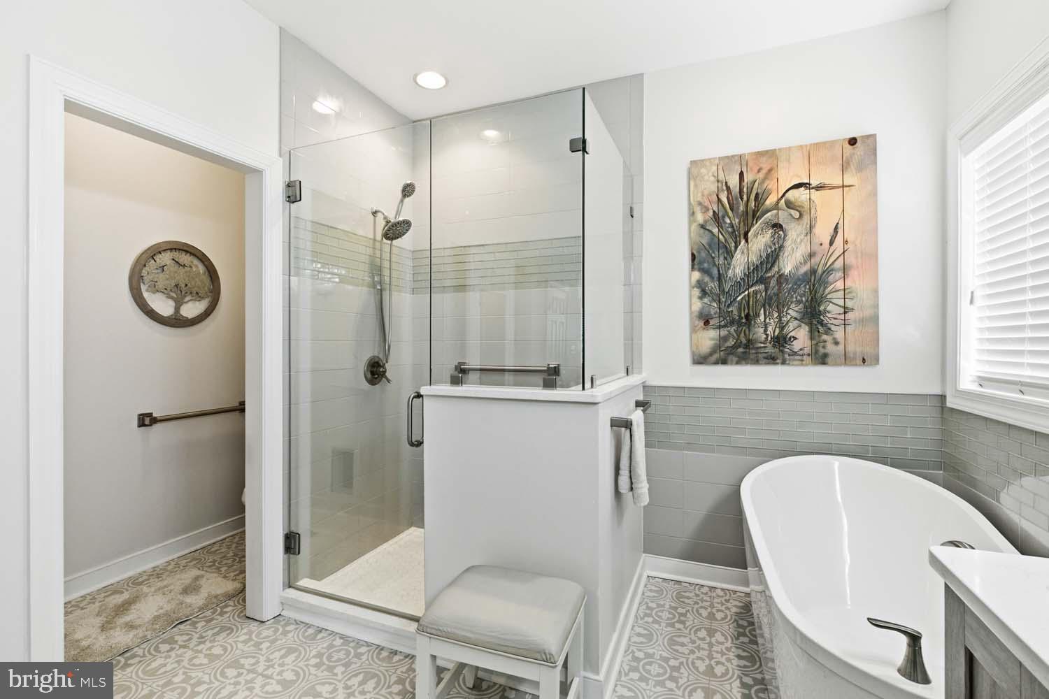 464 Middle Gate Irvington, VA 22480 - Photo 26 of 46 a bathroom with a toilet a sink and a shower