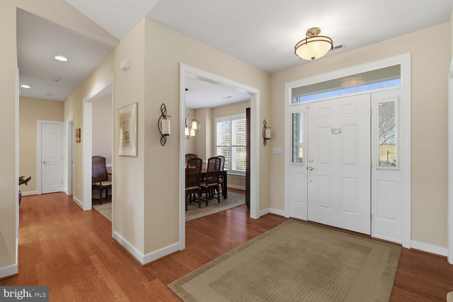 464 Middle Gate Irvington, VA 22480 - Photo 7 of 46 wooden floor in a hall with an entryway in a room