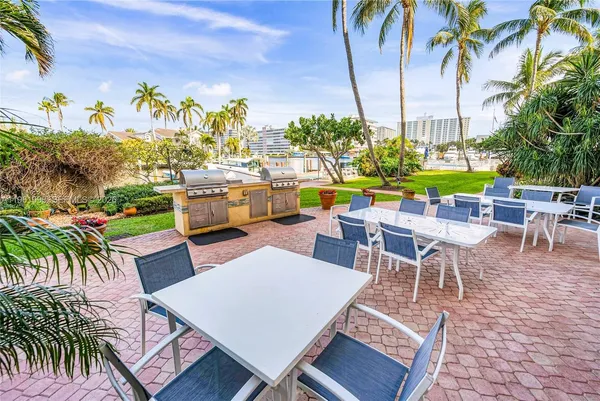 an outdoor space with furniture for seating